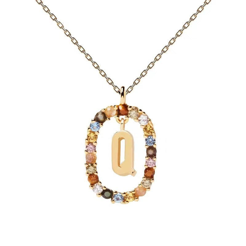 Personalized Gemstone Initial Necklace A Symbol of Uniqueness