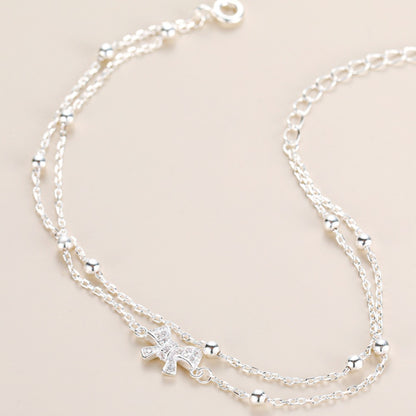 Bow - Accented Silver Bracelet | Double - Layered Whimsy for Your Wrist