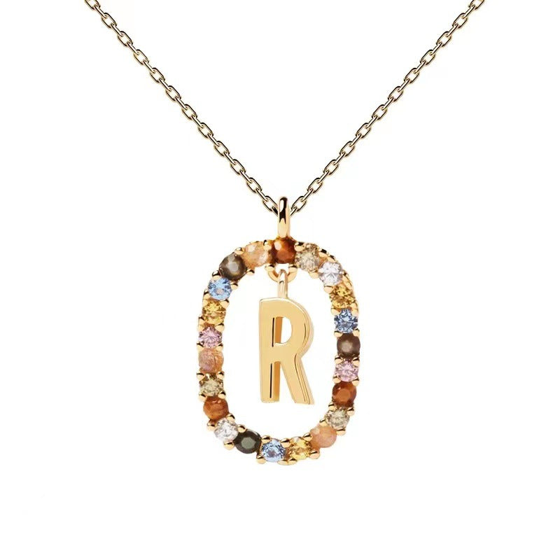 Personalized Gemstone Initial Necklace A Symbol of Uniqueness