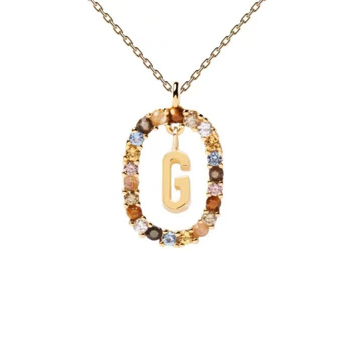 Personalized Gemstone Initial Necklace A Symbol of Uniqueness
