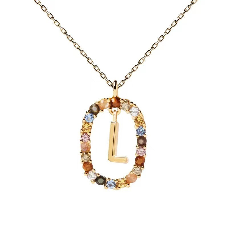 Personalized Gemstone Initial Necklace A Symbol of Uniqueness