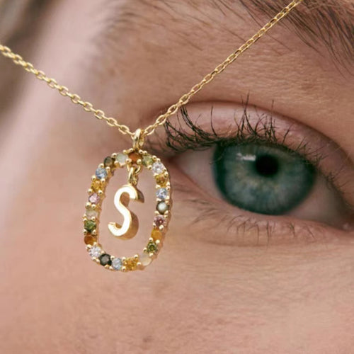 Personalized Gemstone Initial Necklace A Symbol of Uniqueness