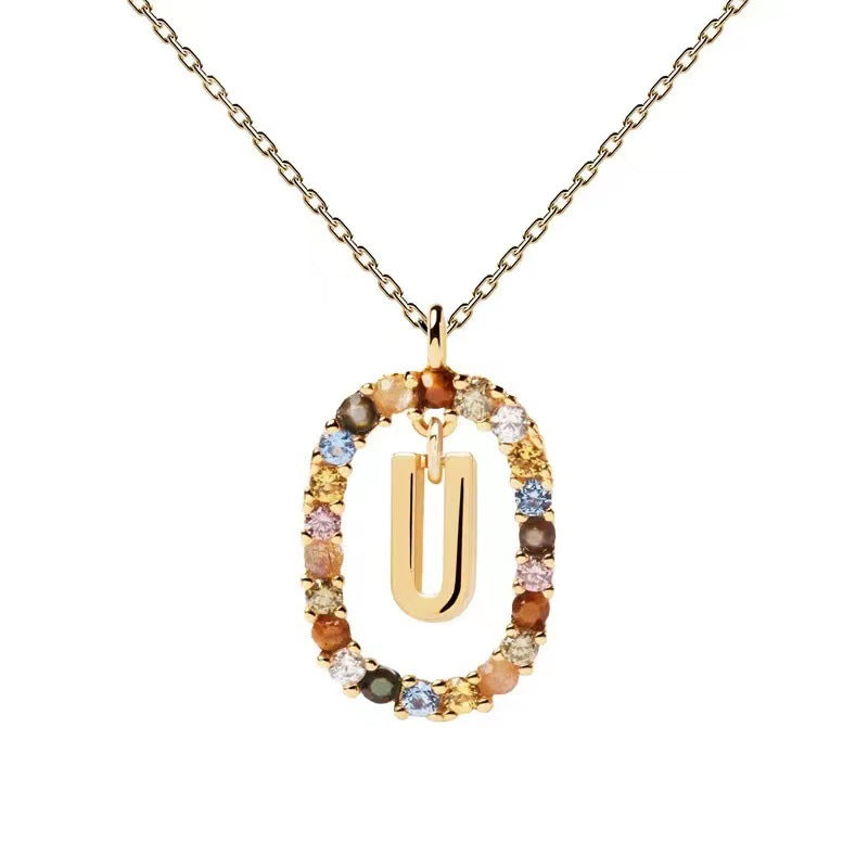 Personalized Gemstone Initial Necklace A Symbol of Uniqueness