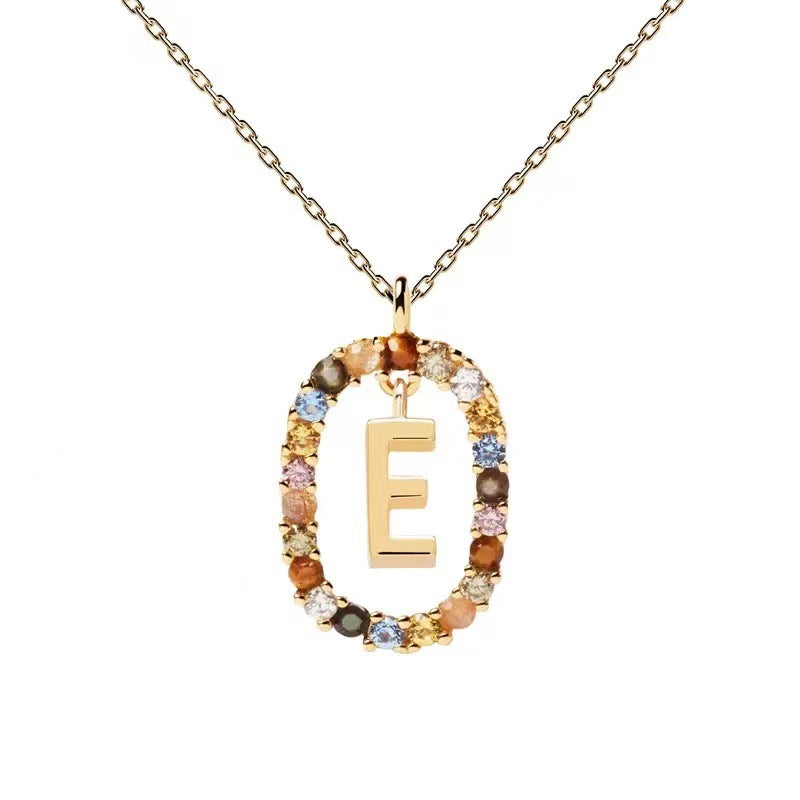Personalized Gemstone Initial Necklace A Symbol of Uniqueness