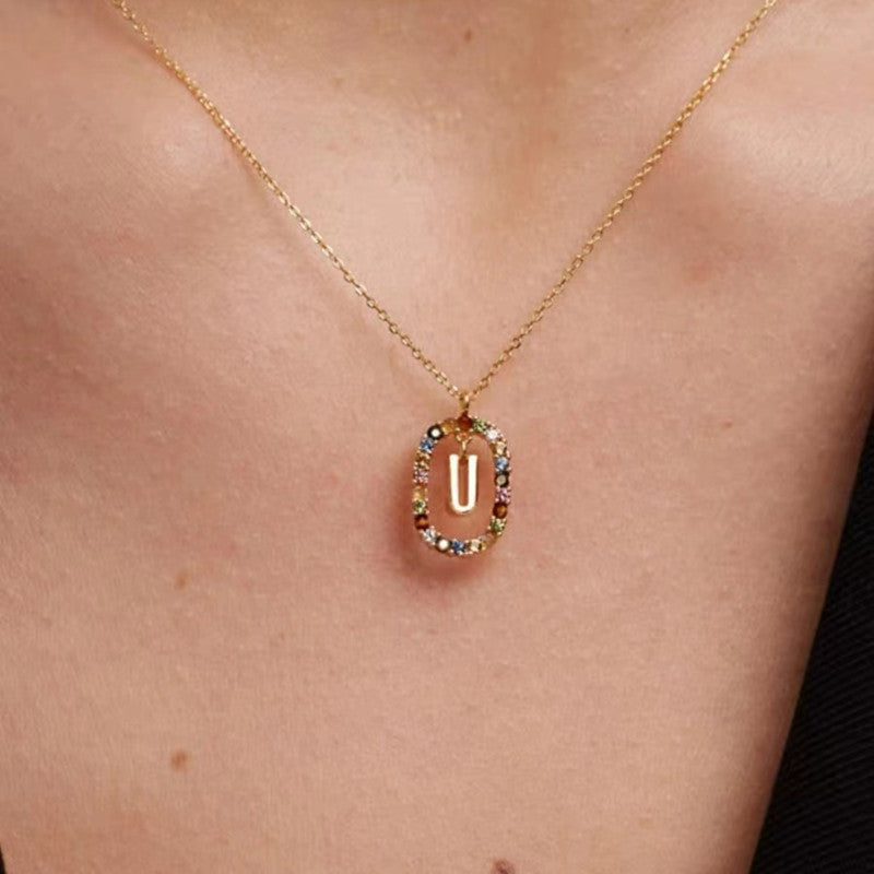 Personalized Gemstone Initial Necklace A Symbol of Uniqueness