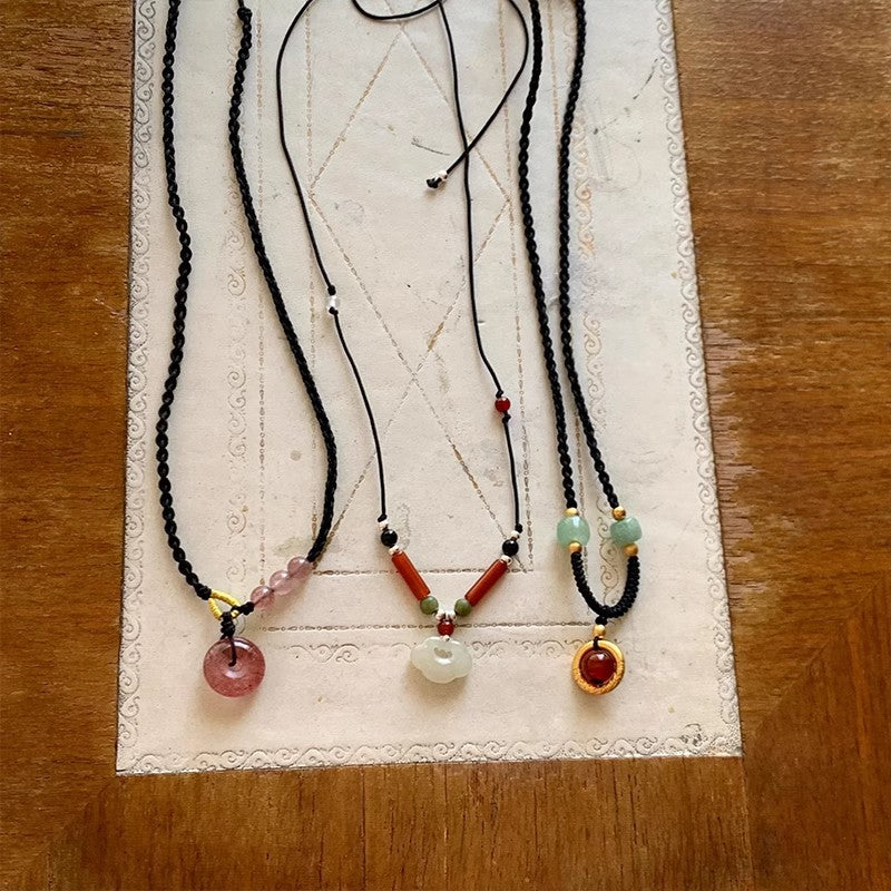 Black Cord as Paper, Gemstones as Ink—An Eastern Poem for the Neck