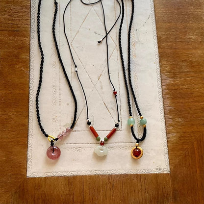 Black Cord as Paper, Gemstones as Ink—An Eastern Poem for the Neck
