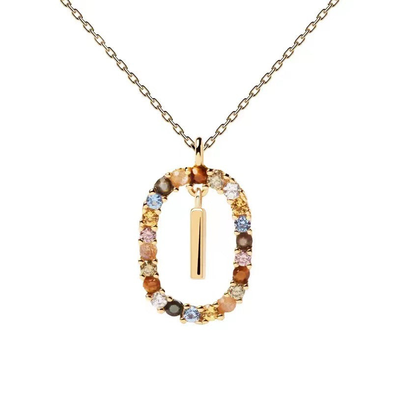 Personalized Gemstone Initial Necklace A Symbol of Uniqueness