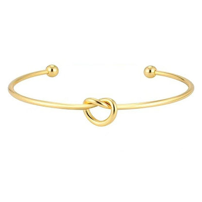 Layered Knot Cuff Bracelets: A Symphony of Shimmer