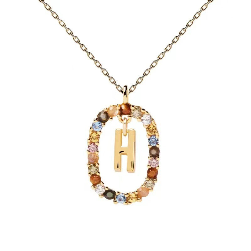 Personalized Gemstone Initial Necklace A Symbol of Uniqueness